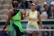 Naomi Osaka (left) shakes hands with Amanda Anisimova (right) after their clash at the 2022 French Open (Source: Getty)